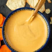 Chipotle Almond dip with crackers and carrots