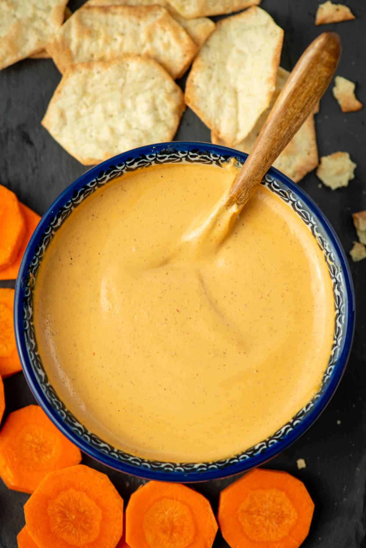 Chipotle Almond dip with crackers and carrots