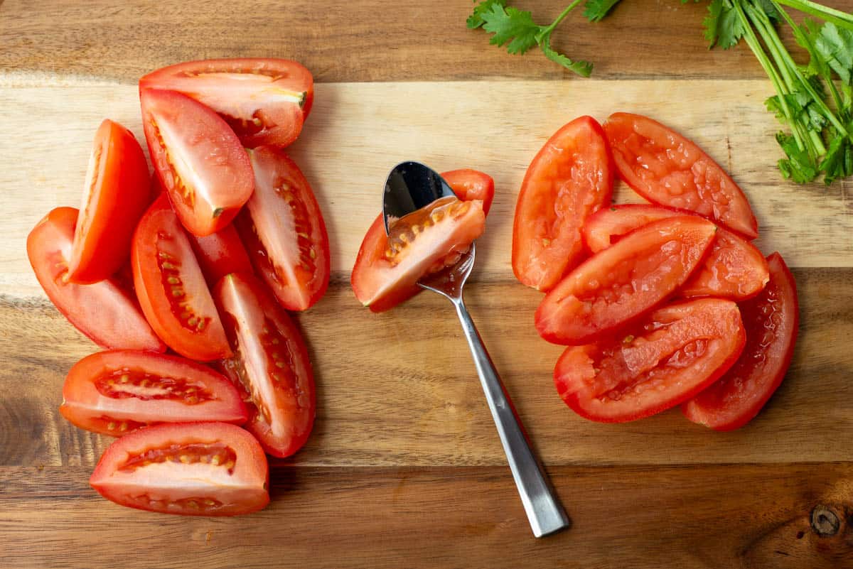 Photo of process of de-seeding tomatoes