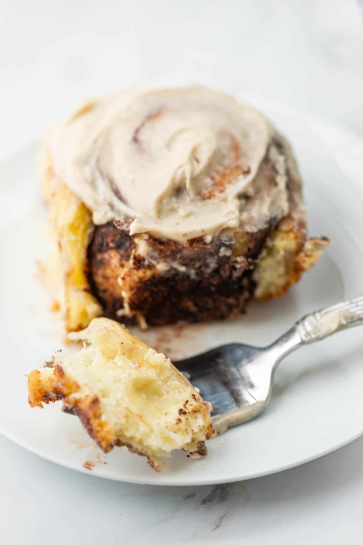 Chocolate sweet roll with espresso frosting on plate