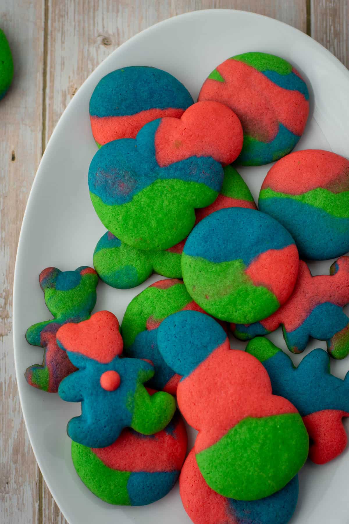 Serving platter with colored cookie dough sugar cookies