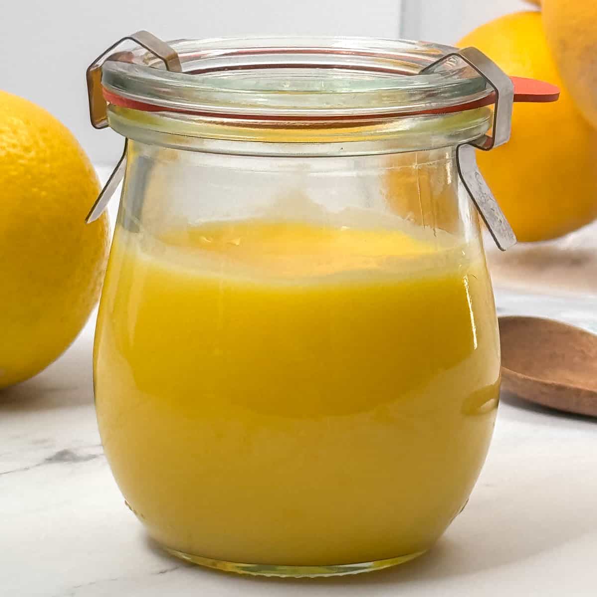 Close up view of jar of lemon curd