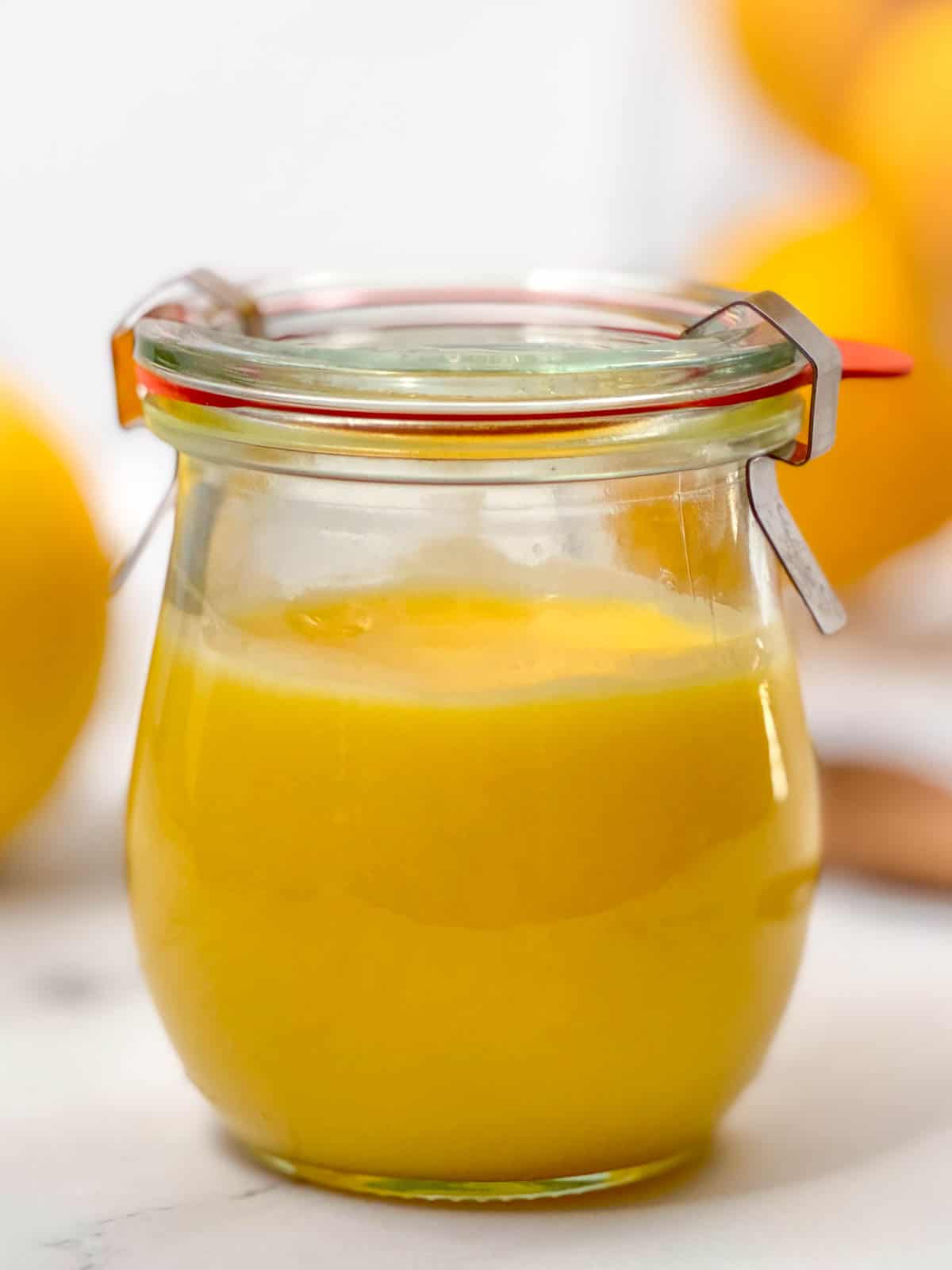 Close up view of jar of lemon curd