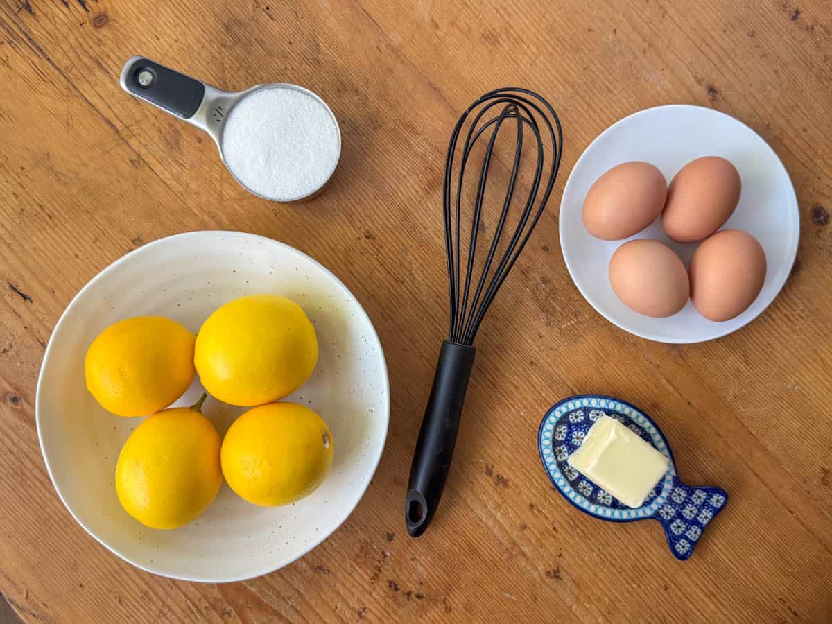 Ingredients to make lemon curd: lemons, eggs, sugar and butter