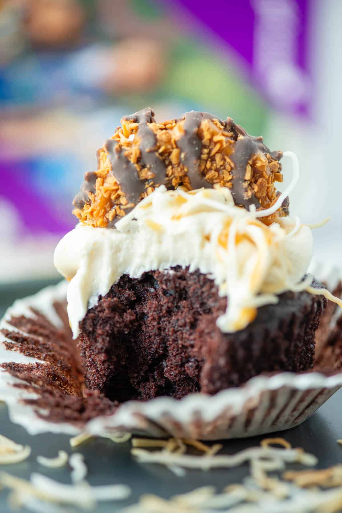 Close up of Samoas Cupcake with bite taken out