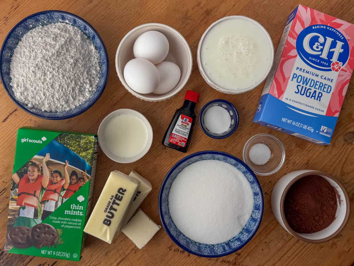 Ingredients needed to make Thin Mints cupcakes: Thin Mints cookies, cake flour, butter, eggs, white sugar, peppermint extract, baking soda, salt, cocoa powder, buttermilk, powdered sugar, heavy whipping cream