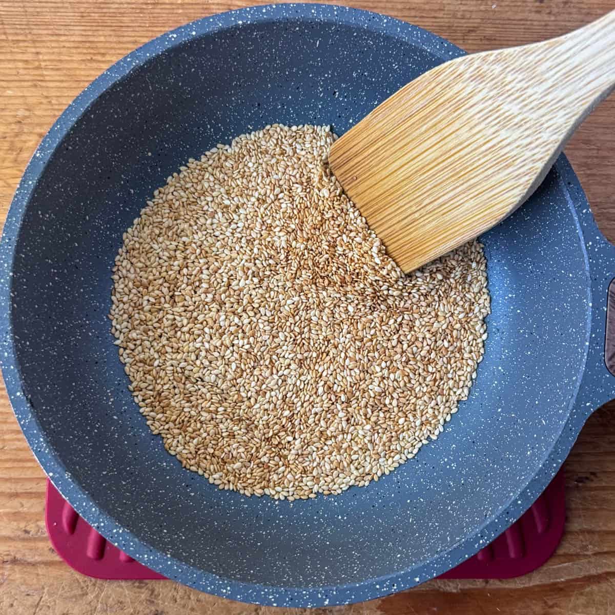 Process shot of toasted white sesame seeds