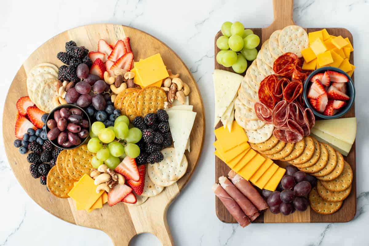 Overhead view of two charcuterie boards next to each other