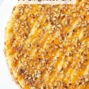 Top view of a partial salted caramel pecan cheesecake with a title overlay that says Salted Caramel Pecan Cheesecake and another title overlay that says www.nextleverlbaker.com