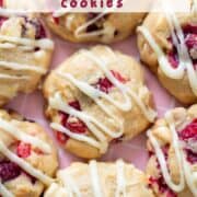 Close up overhead photo of 8 white chocolate cranberry orange cookies on a plate with a title overlay and another overlay that says www.nextlevelbaker.com