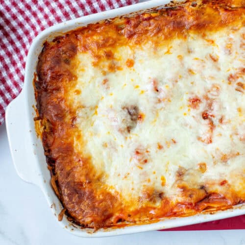 Overhead partial view of a finished pan of veggie lasagna