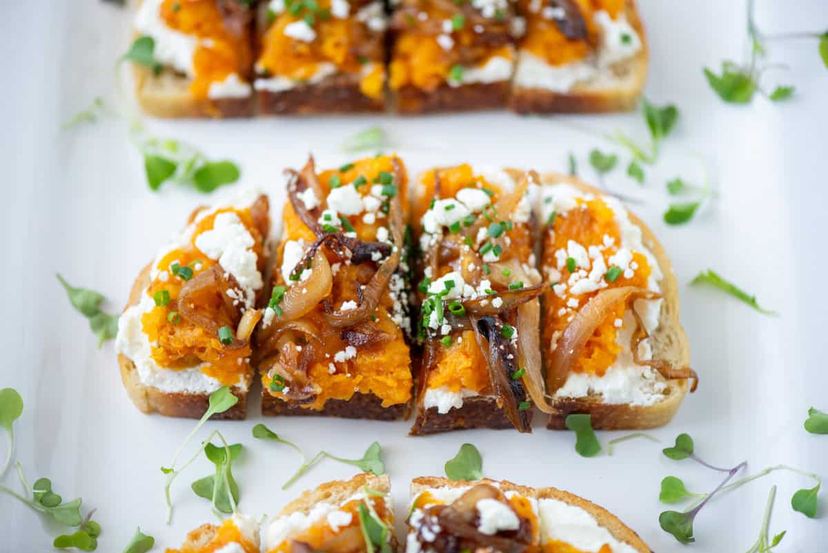 Close up view of squash toast sliced in quarters