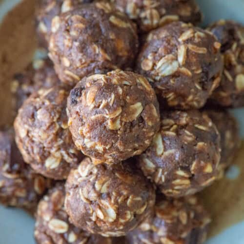 Overhead image of a stacked chocolate protein powder balls on a plate