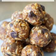 Side view of no bake oatmeal peanut butter balls stacked on a plate with a title overlay that says No Bake Oatmeal Peanut Butter Balls