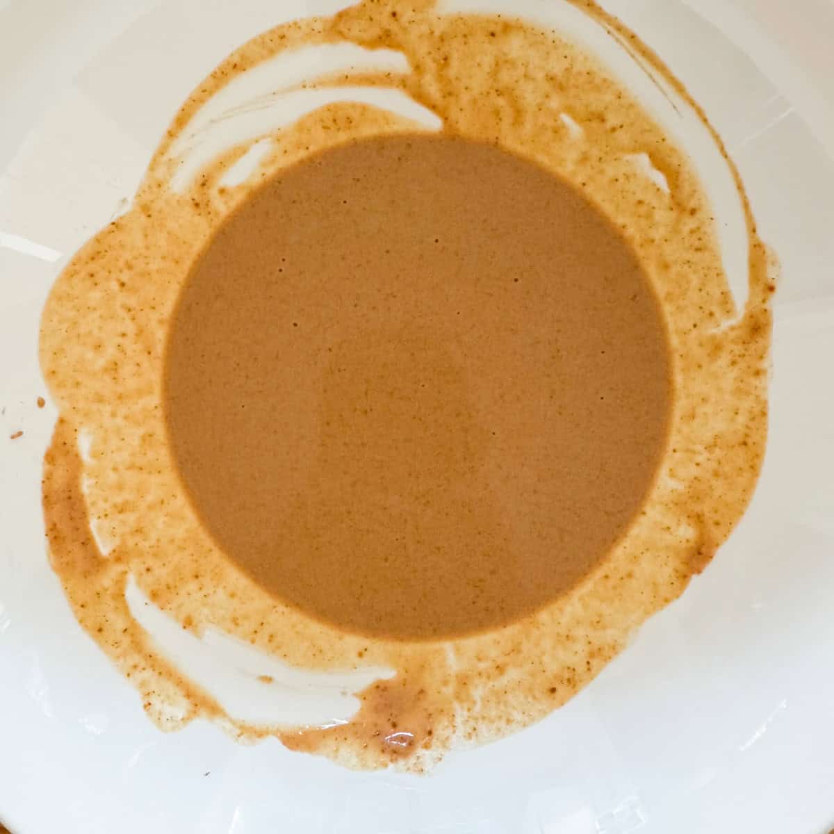 Step one of making no bake oatmeal peanut butter balls:add the peanut powder and water to a medium bowl and stir until powder is dissolved