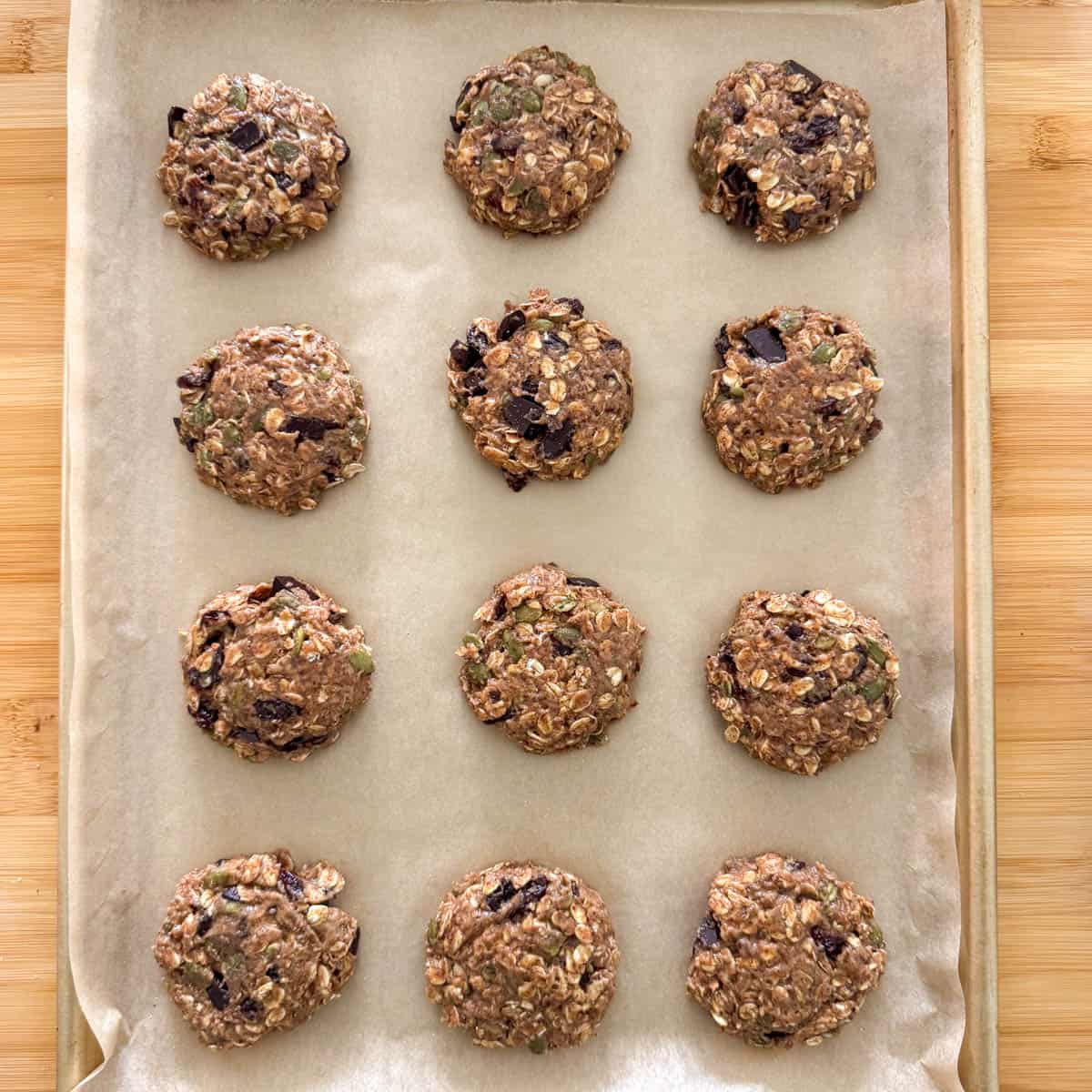 Breakfast cookies on a baking sheet waiting to be baked