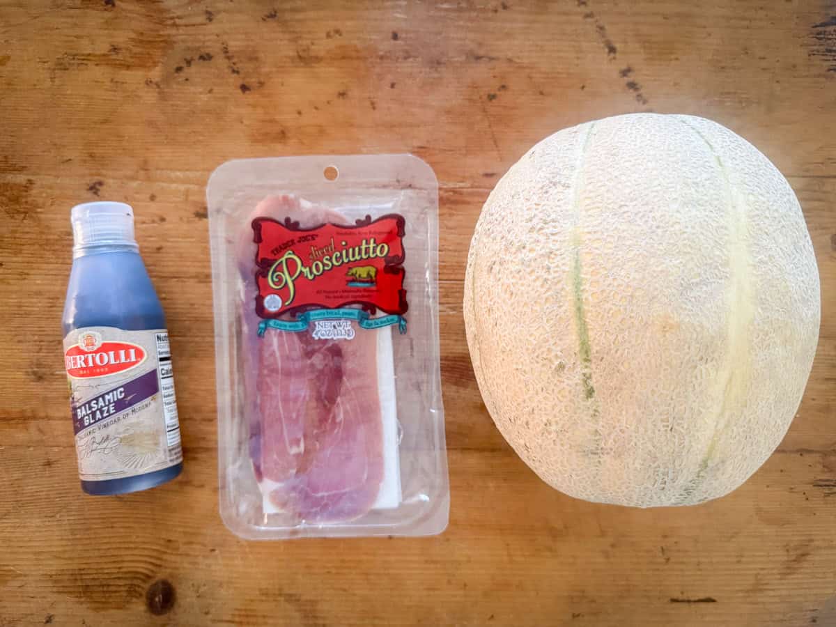 Ingredients needed to make prosciutto wrapped melon: cantaloupe, prosciutto and optional balsamic glaze