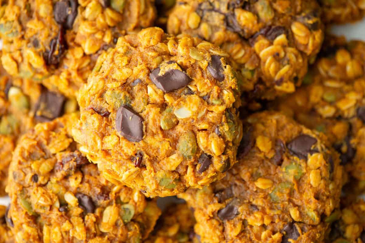 Overhead view of a stacked pile of pumpkin breakfast cookies