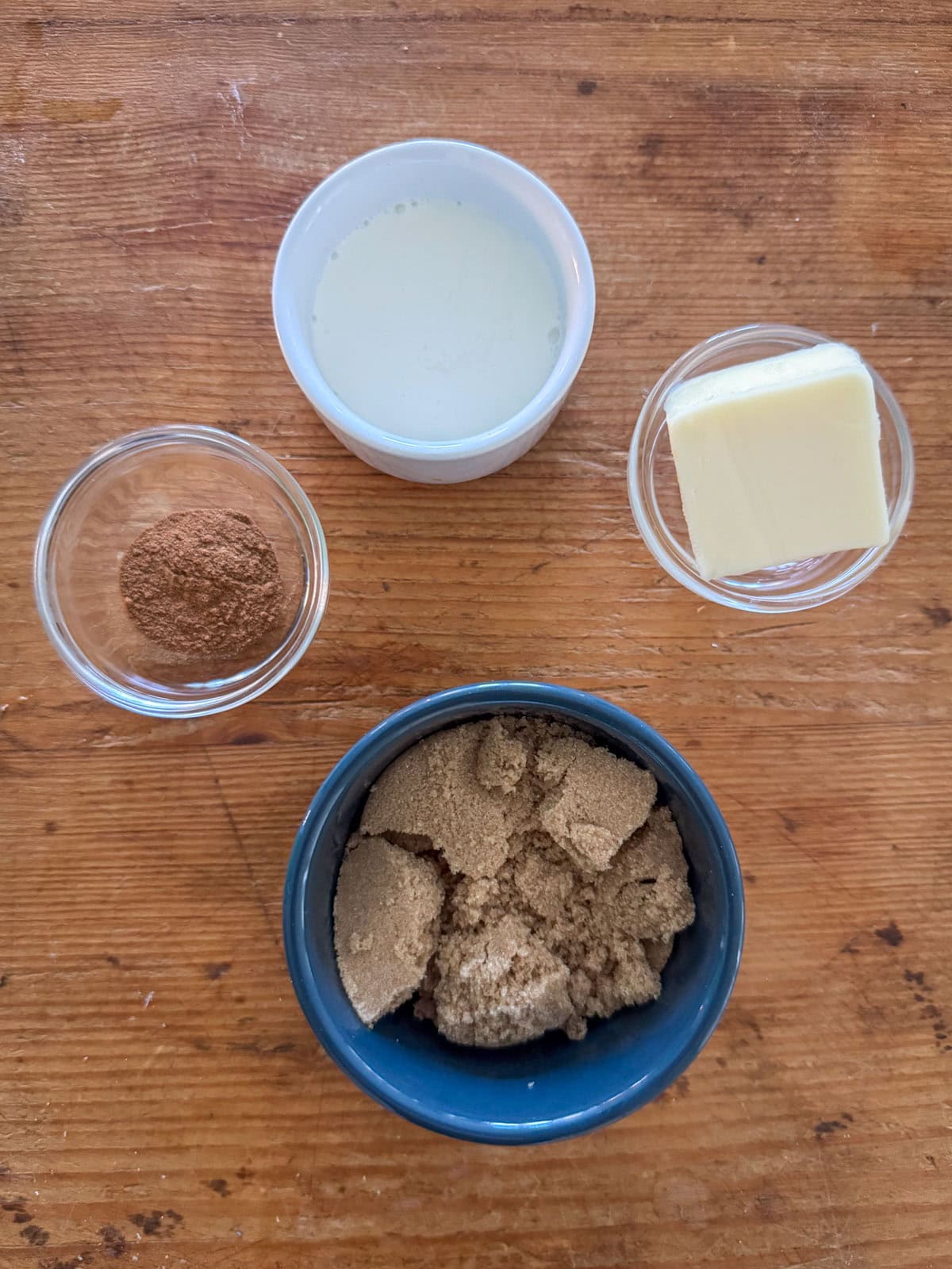 Ingredients needed for pumpkin spice glaze: brown sugar, salted butter, heavy cream and pumpkin pie spice